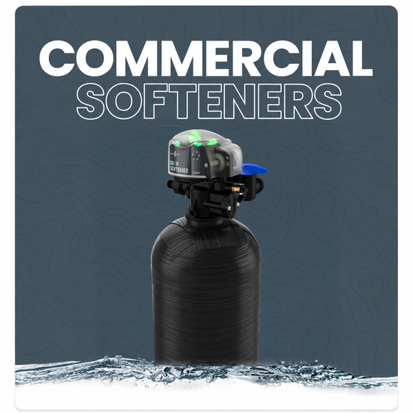 Group of five commercial water softener tanks with control valves